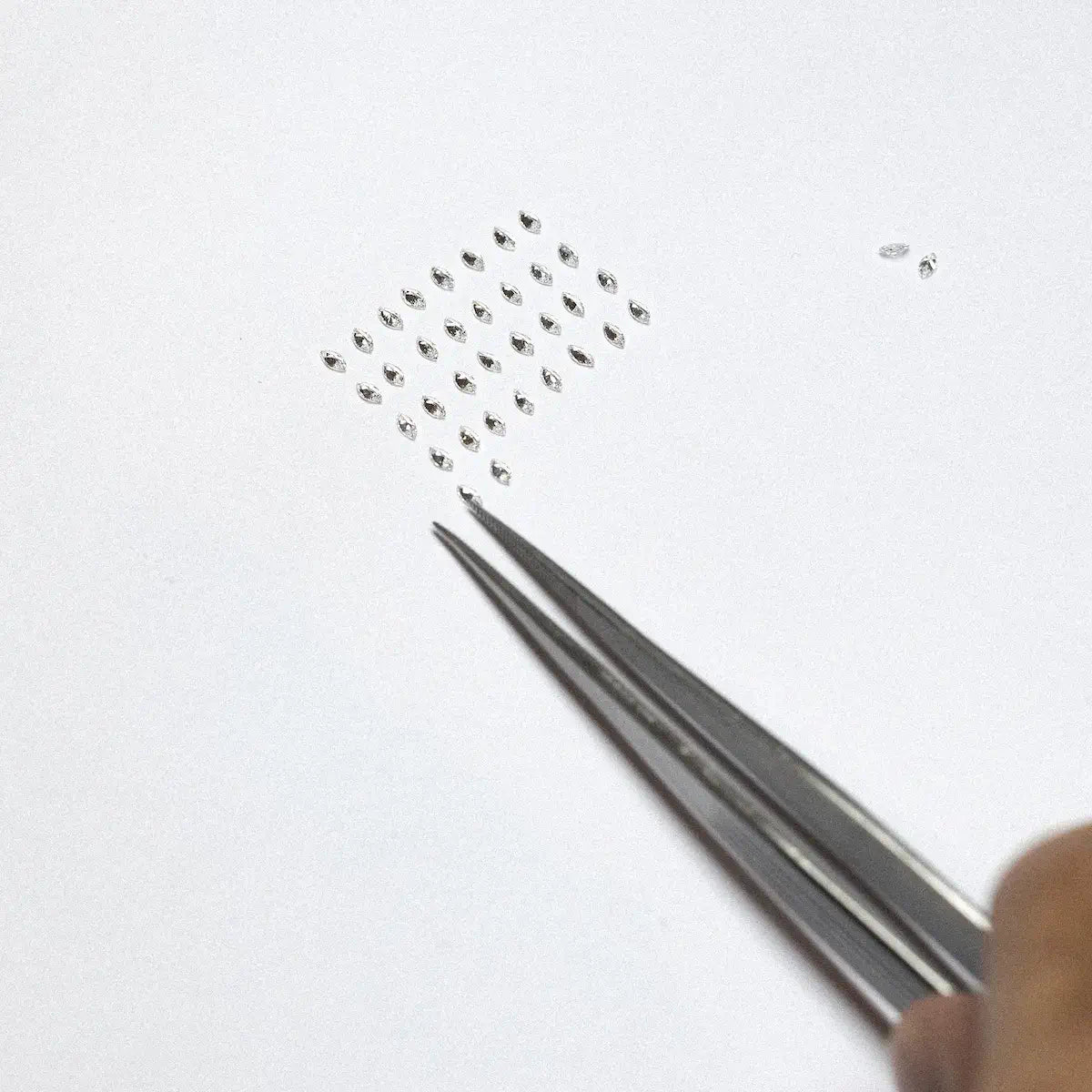 Tri de diamants marquise pour choisir ceux aux proportions idéales