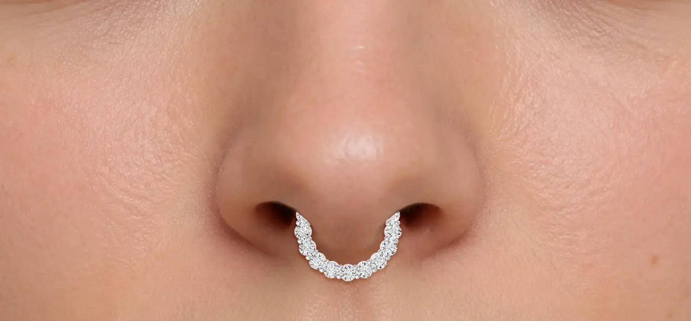 Close-up of a person wearing a nose ring or what we call septum piercing